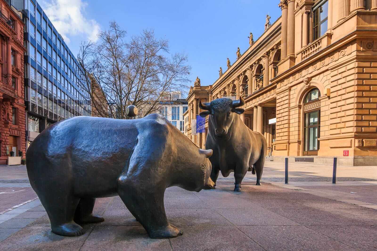 Bull and bear at Frankfurt Stock Exchange in Germany_Image by Marco Ritzki via Shutterstock